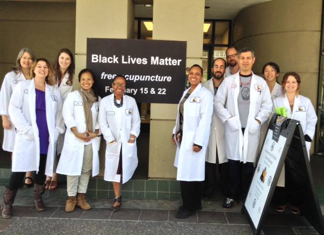 acupuncture students standing in front of black lives matter sign